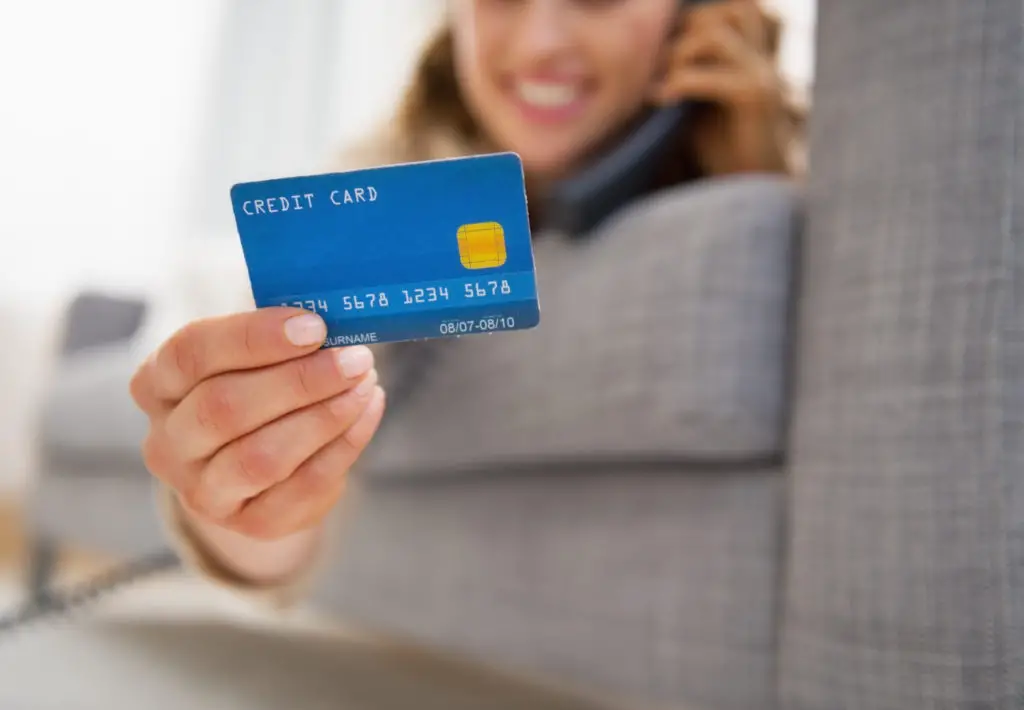 woman negotiating credit card debt on phone